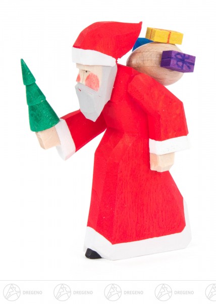 Weihnachtsmann mit Geschenken und Baum, geschnitzt